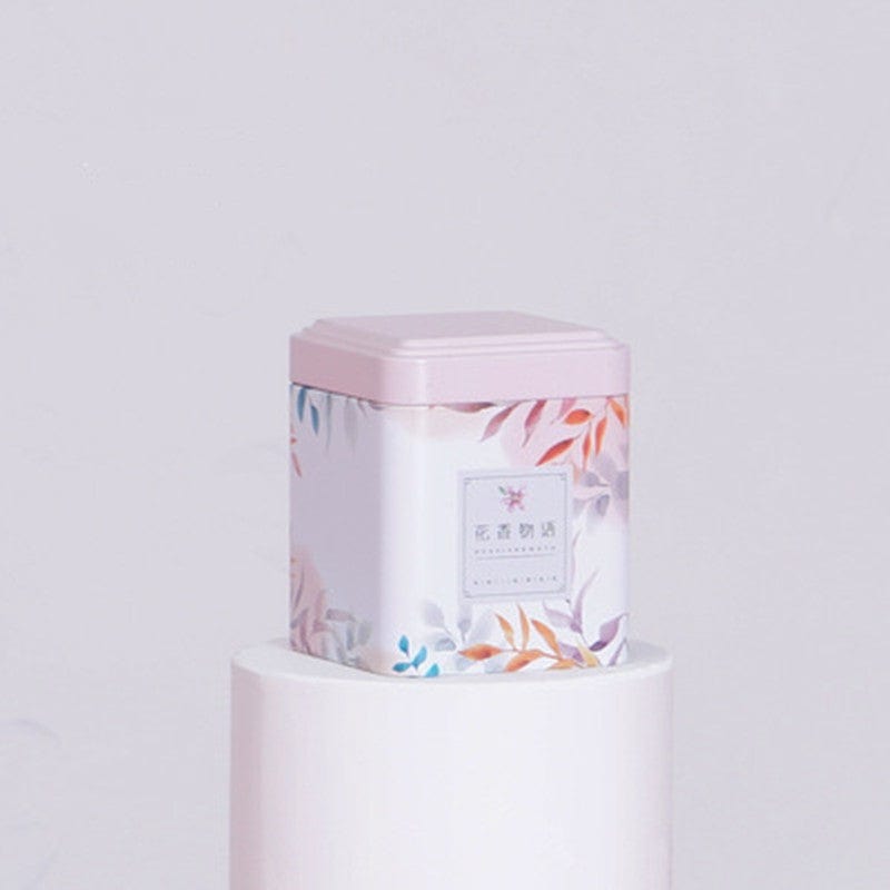 Metalen theedoos in de vorm van een roos en bloem