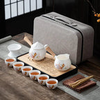 Chinees wit porseleinen theeservies met elegant vispatroon