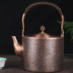 Chinese gehamerde koperen theepot 2L