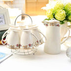 Elegante witte Engelse porseleinen theeset