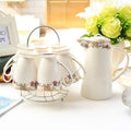Elegante witte Engelse porseleinen theeset