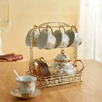 Engelse witte en gouden porseleinen theeset