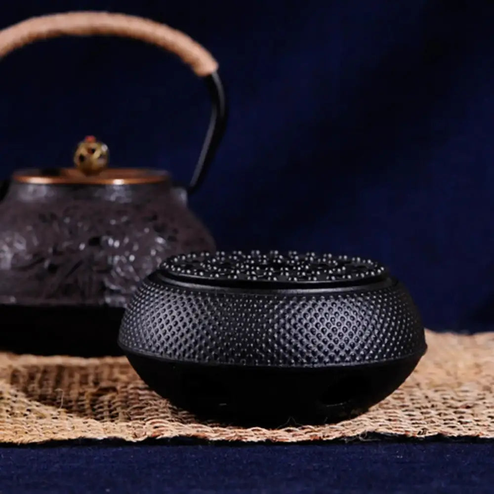 Gietijzeren theepot warmhouder 14,5 cm