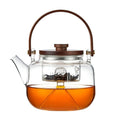 Glazen theepot 1,1 liter met stoominfuser en houten handgreep