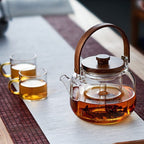 Glazen theepot 1,1 liter met stoominfuser en houten handgreep