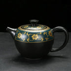 Hoogwaardige Chinese zwarte en gouden theeset