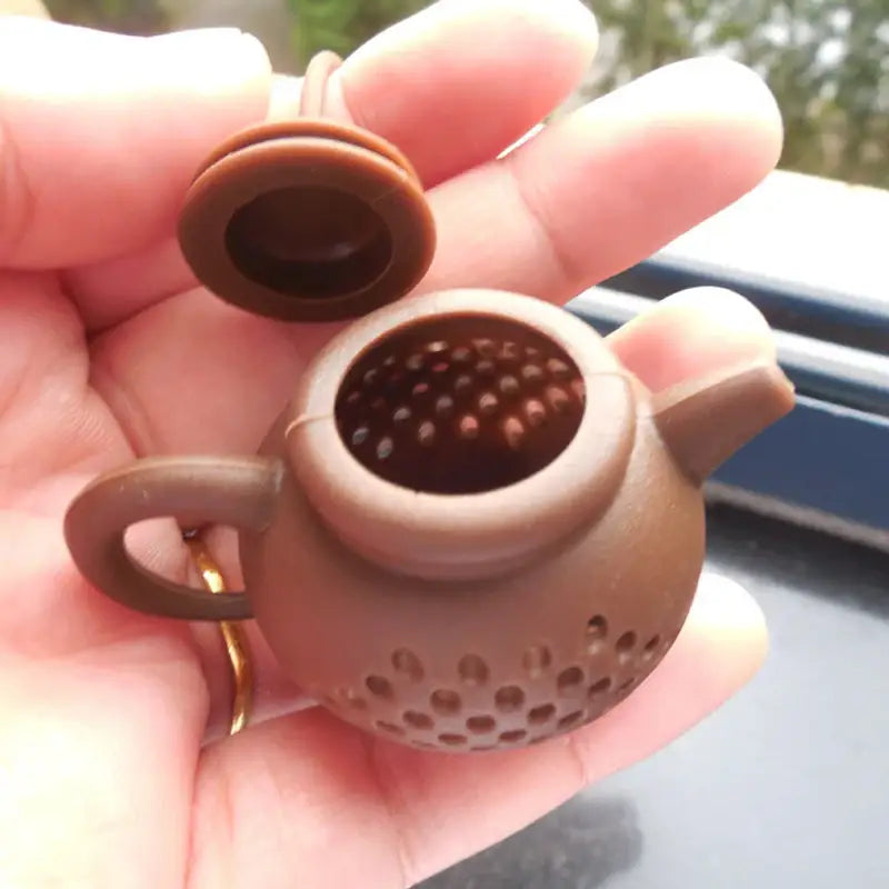 Siliconen thee-infuser in theepotvorm met koord – afbeelding 9