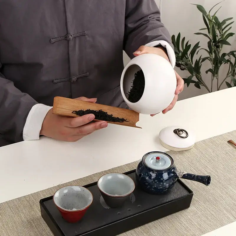 Keramische theedoos met Japans motief