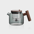 Ronde theepot van glas en hout met infuserknop 700 ml