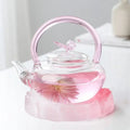 Roze glazen theepot met vlinder 700ml