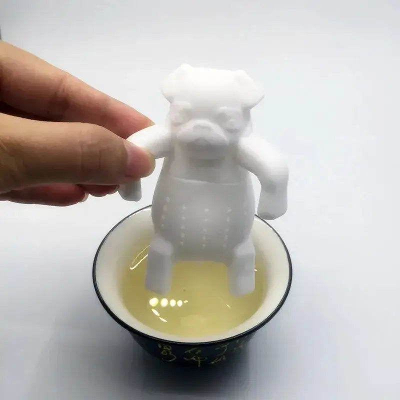 Thee-infuser in hondvorm