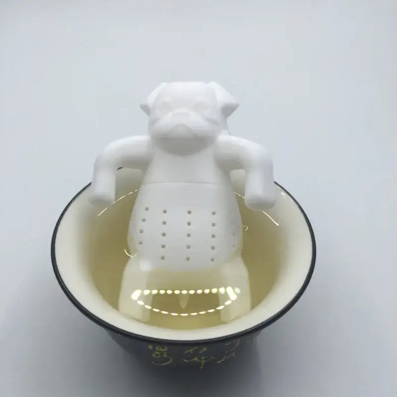 Thee-infuser in hondvorm