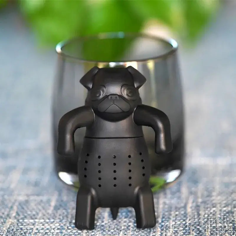 Thee-infuser in hondvorm