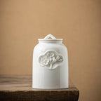 Witte keramische theedoos in antieke stijl