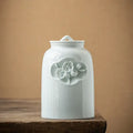 Witte keramische theedoos in antieke stijl