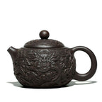 Yixing theepot 300 ml van zwarte klei met drakenreliëf